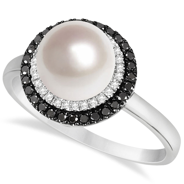 This halo fashion ring features one 8mm light cream to pinkish-white pearl surrounded by a halo of white diamonds which is encased in another halo of black diamonds.With a total of 57 diamonds of approximately one quarter carat a single cultured pearl is bathed in shimmering reflective light.Perfect as a fashion right hand or individual finger ring this 14k white gold freshwater pearl and diamond ring will add sophistication to any outfit.