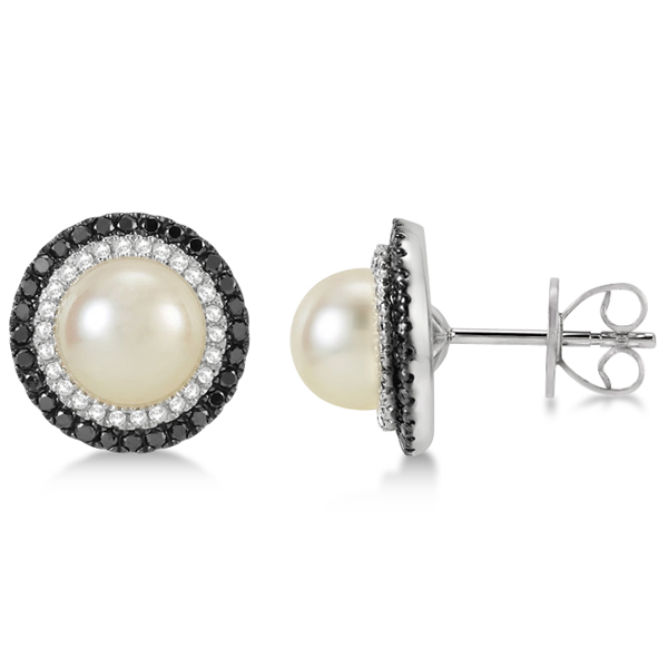 These elegant black and white diamond stud earrings encircle a light cream to pinkish white freshwater pearl in a lovely halo design.Each channel set diamond adds sparkle and dimeion to its center pearl bathing it in breathtaking light.These 14K white gold pearl and black and white diamond halo studs earrings feature 0.50cw sure to pick up any outfit.