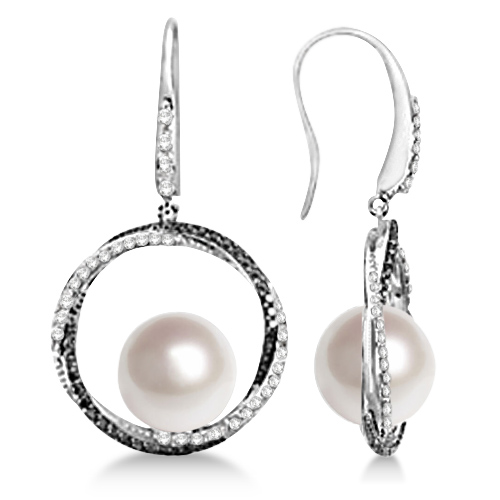 These colored diamond hanging earrings feature a Paspaley cultured South Sea pearl at the bottom of intertwined circles of white and black diamonds.Sturdy hook earrings with 0.75ctw of diamonds is impressive enough add near round 11mm Paspaley South Sea pearls and these hanging earrings will surely be her new favorites day and night. 