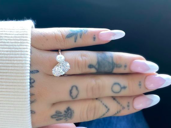 A close-up of Ariana Grande's pearl and diamond engagement ring. Photo: Instagram.