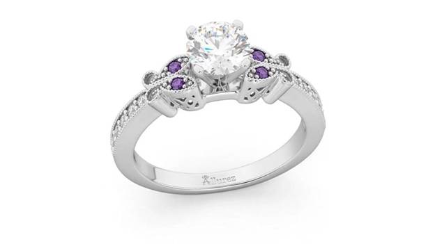 a butterfly diamond engagement ring