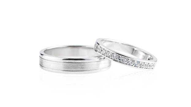 a pair of silver wedding bands