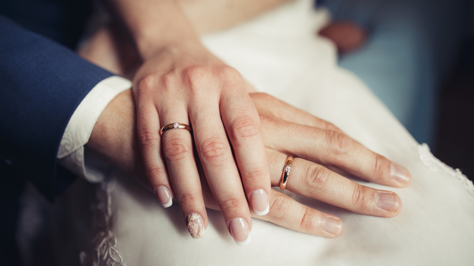 Valentine’s Day Gift Guide: a person’s hands holding a heart-shaped box