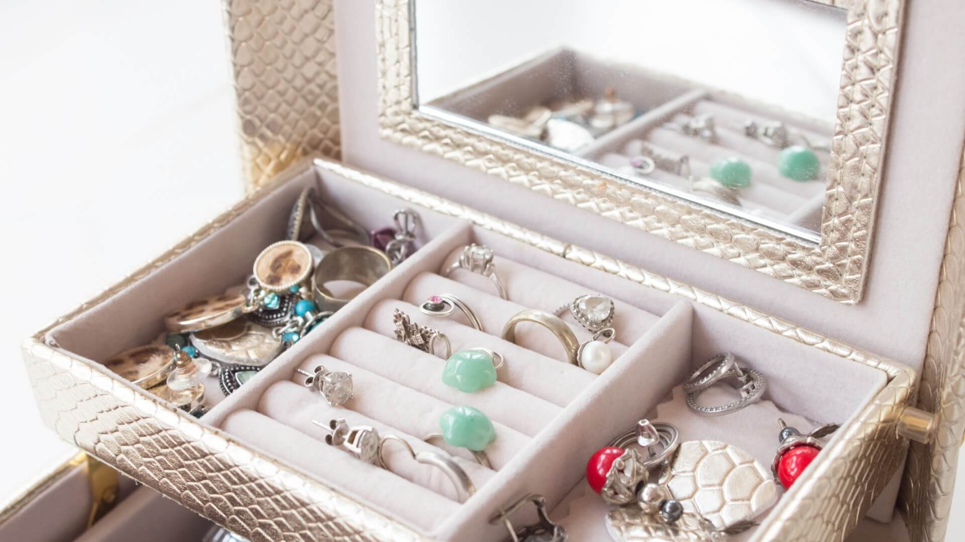 Jewelry box full of jewelry | How to Store Jewelry: 11 Tips for Jewelry Storage | Allurez