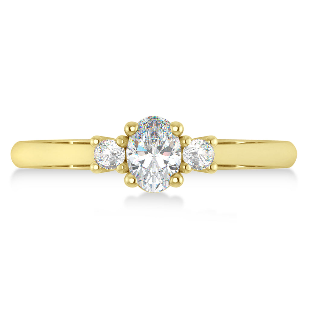 Small Oval Moissanite & Diamond Three-Stone Engagement Ring 14k Yellow Gold (0.60ct)