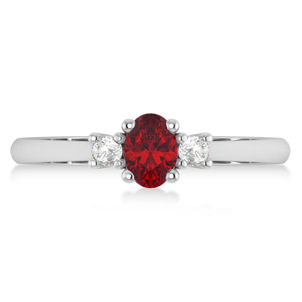 Small Oval Ruby & Diamond Three-Stone Engagement Ring 14k White Gold (0.60ct)