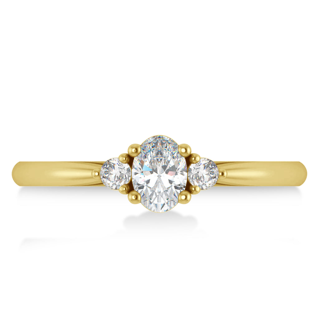 Oval Moissanite & Diamond Three-Stone Engagement Ring 14k Yellow Gold (0.60ct)