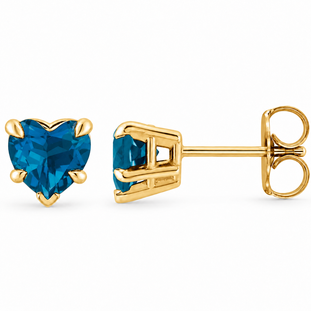 Heart natural blue topaz stud earrings 14K yellow gold — angle view