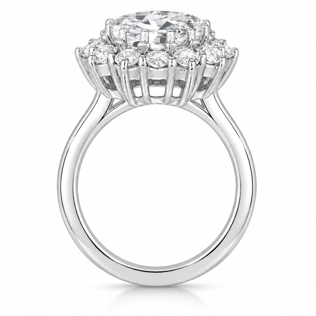 True side profile of oval lab-grown diamond and 12-diamond halo ring in 18k white gold with circular shank