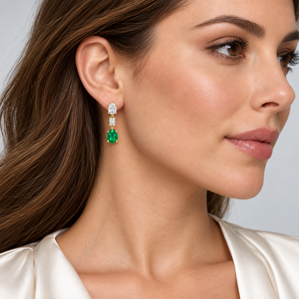 Oval Lab Grown Emerald & Diamond Drop Earrings 14k Yellow Gold (6.70ctw) — first model view, four-prong setting, 1.20 inches long by 0.33 inches wide
