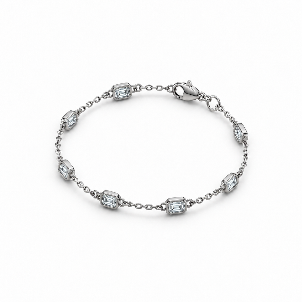 1.50ctw emerald-cut lab-grown Diamonds by the Yard bracelet in 14k white gold - angled view at matching anklet scale