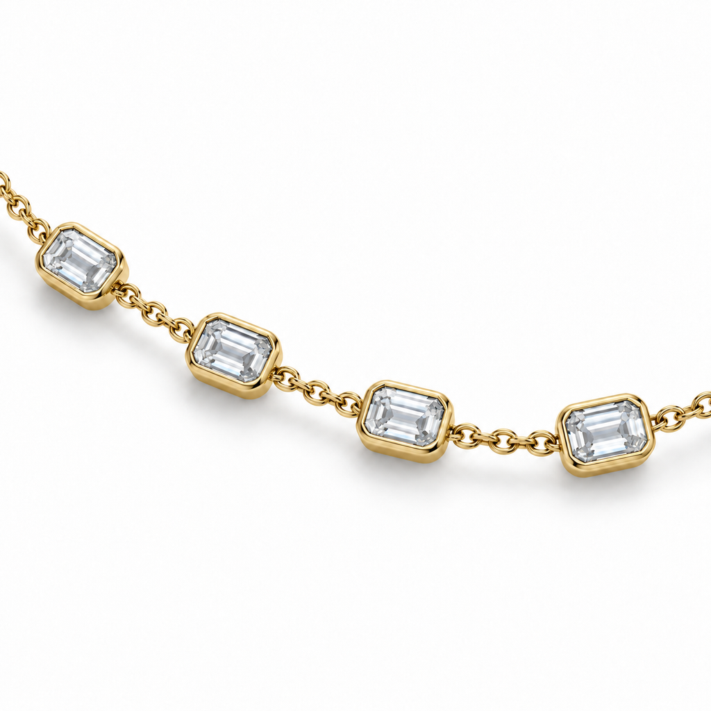 4.00ctw emerald-cut lab-grown Diamonds by the Yard necklace in 14k yellow gold - angled close-up of four diamond stations