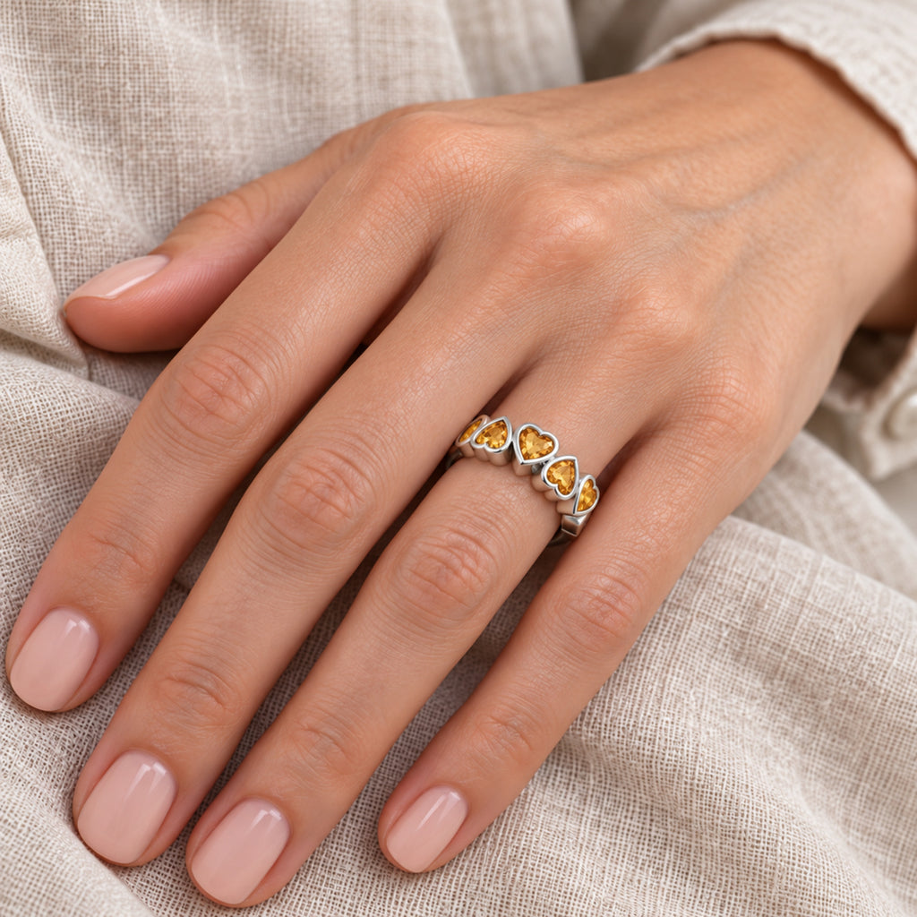 AZ29512 five heart natural citrine ring in sterling silver — close-up hand model view