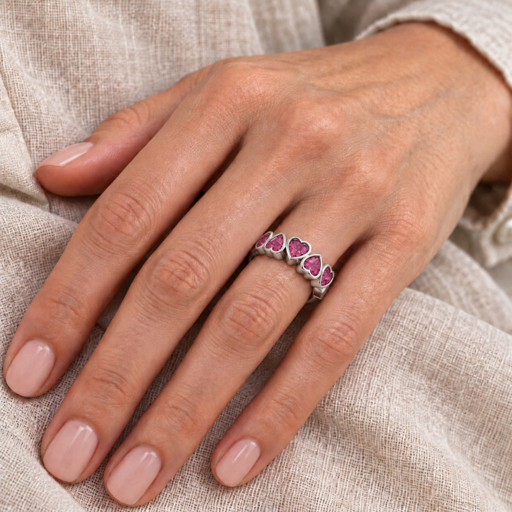 AZ29516 natural pink tourmaline five heart ring — close-up hand model view