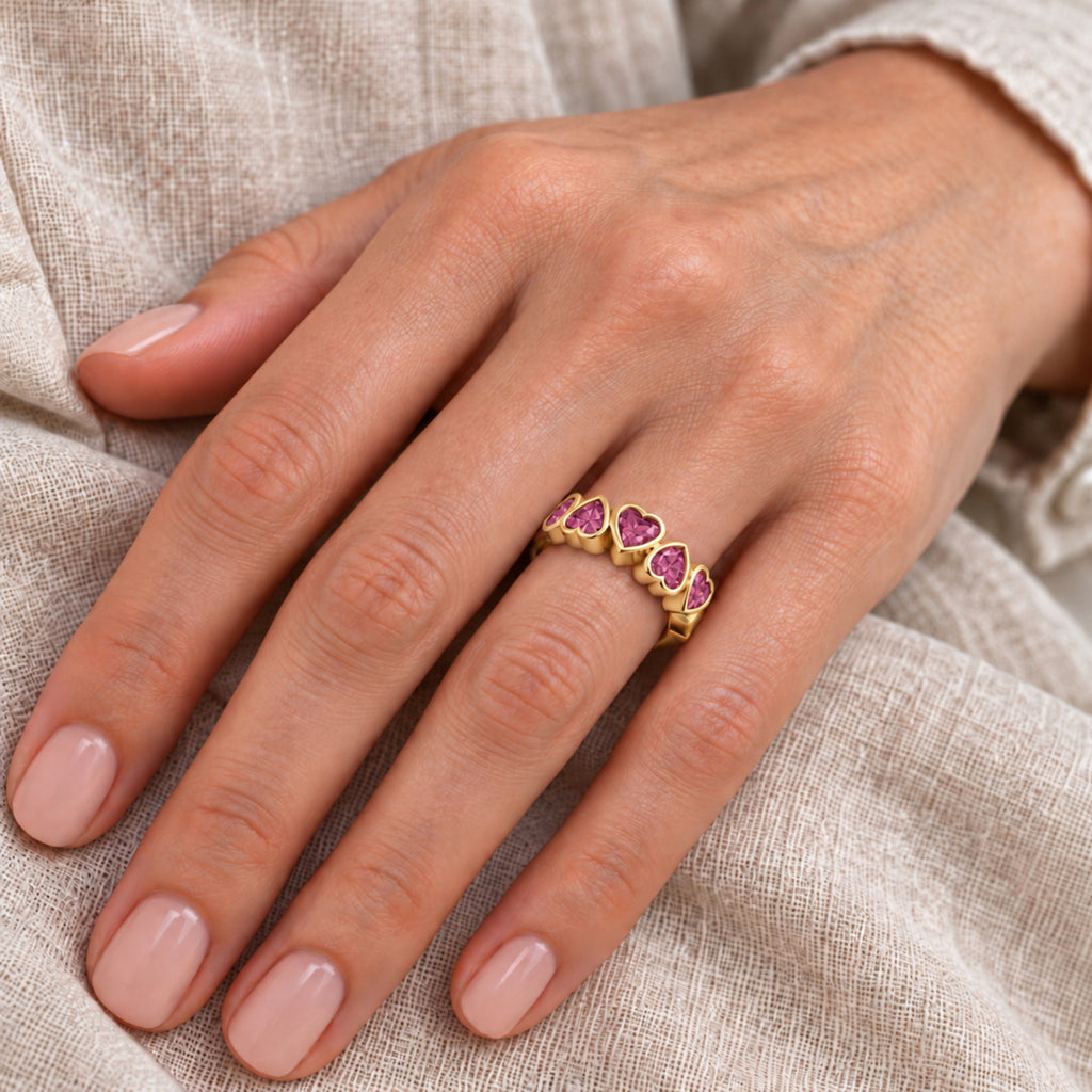 AZ29517 natural pink tourmaline five heart ring — close-up hand model view