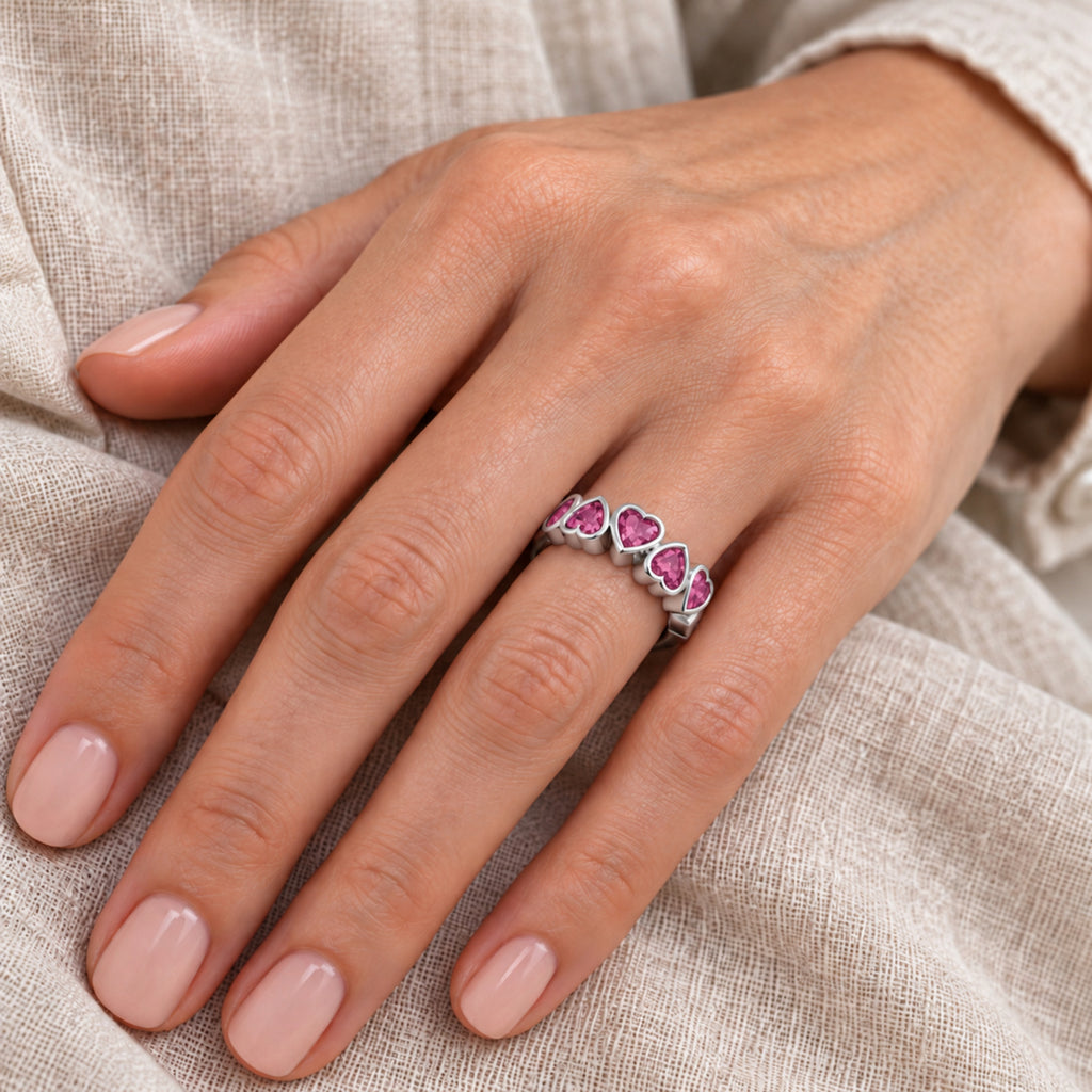AZ29518 natural pink tourmaline five heart ring — close-up hand model view