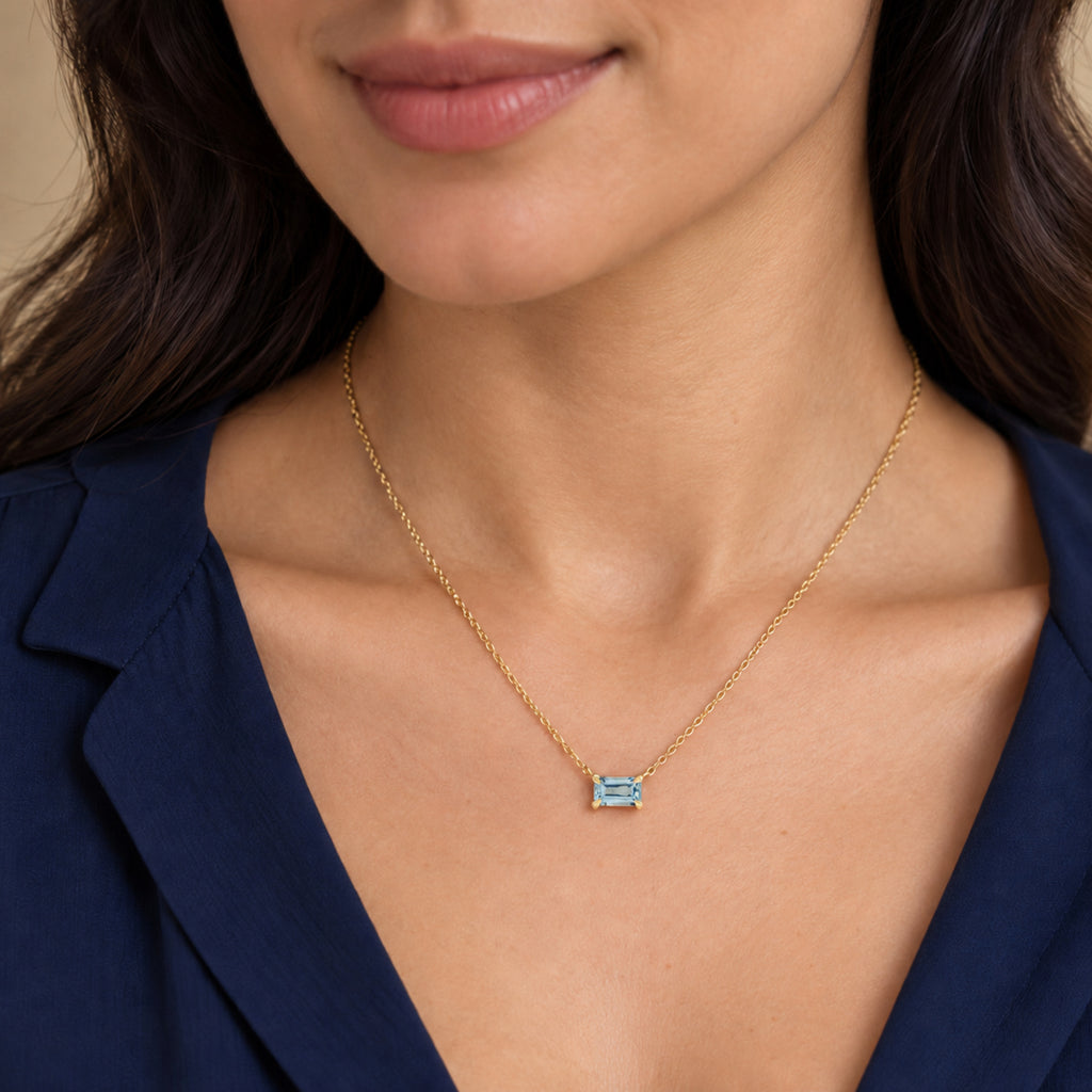 AZ29526 natural aquamarine solitaire necklace in 14K yellow gold - close-up model view
