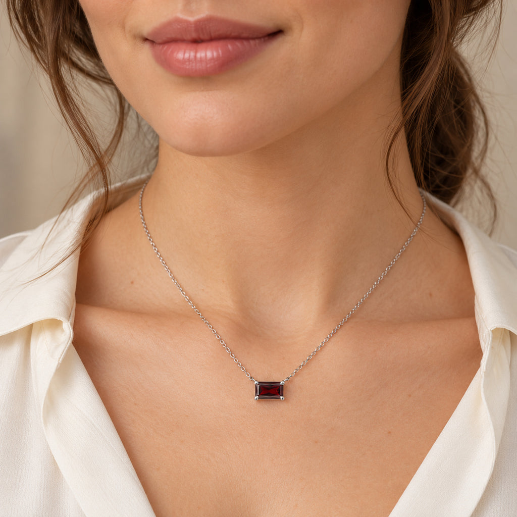 AZ29533 natural Mozambique garnet solitaire necklace in 14K white gold - close-up model view
