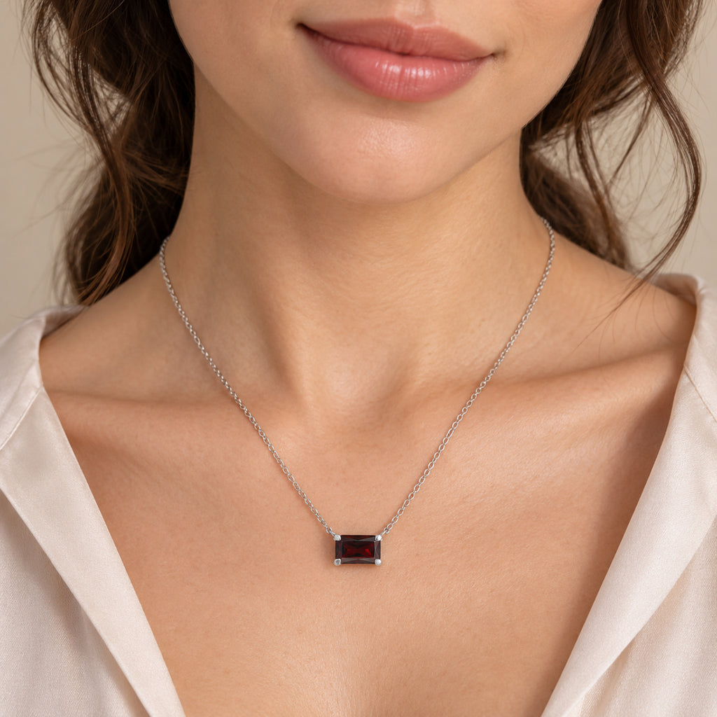 AZ29535 natural Mozambique garnet solitaire necklace in sterling silver - close-up model view