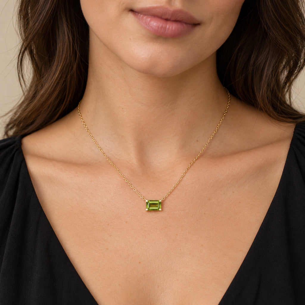 AZ29537 natural peridot solitaire necklace in 14K yellow gold - close-up model view