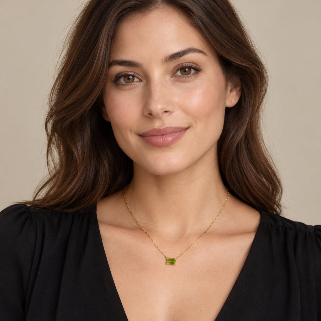 AZ29537 natural peridot solitaire necklace in 14K yellow gold - full-face model view
