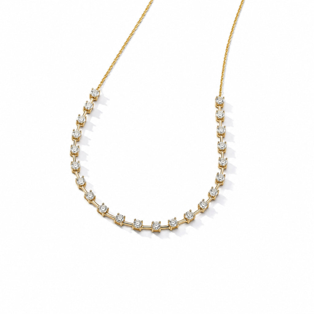 Interval diamond tennis necklace in 14K yellow gold — angled product view on white with soft shadows.; reference design; reference design