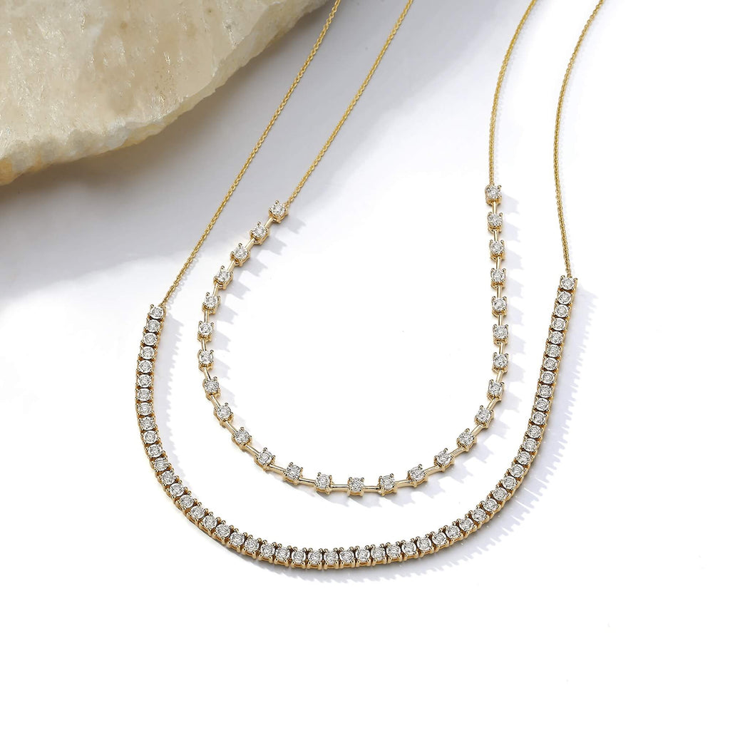 Interval tennis necklace in 14K yellow gold — styled view; additional jewelry shown for styling; reference design; reference design