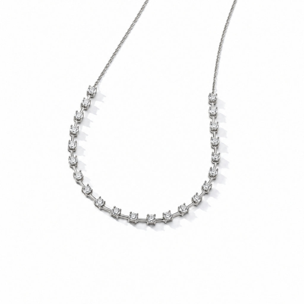 Interval diamond tennis necklace in 14K white gold — angled product view on white with soft shadows.; reference design; reference design