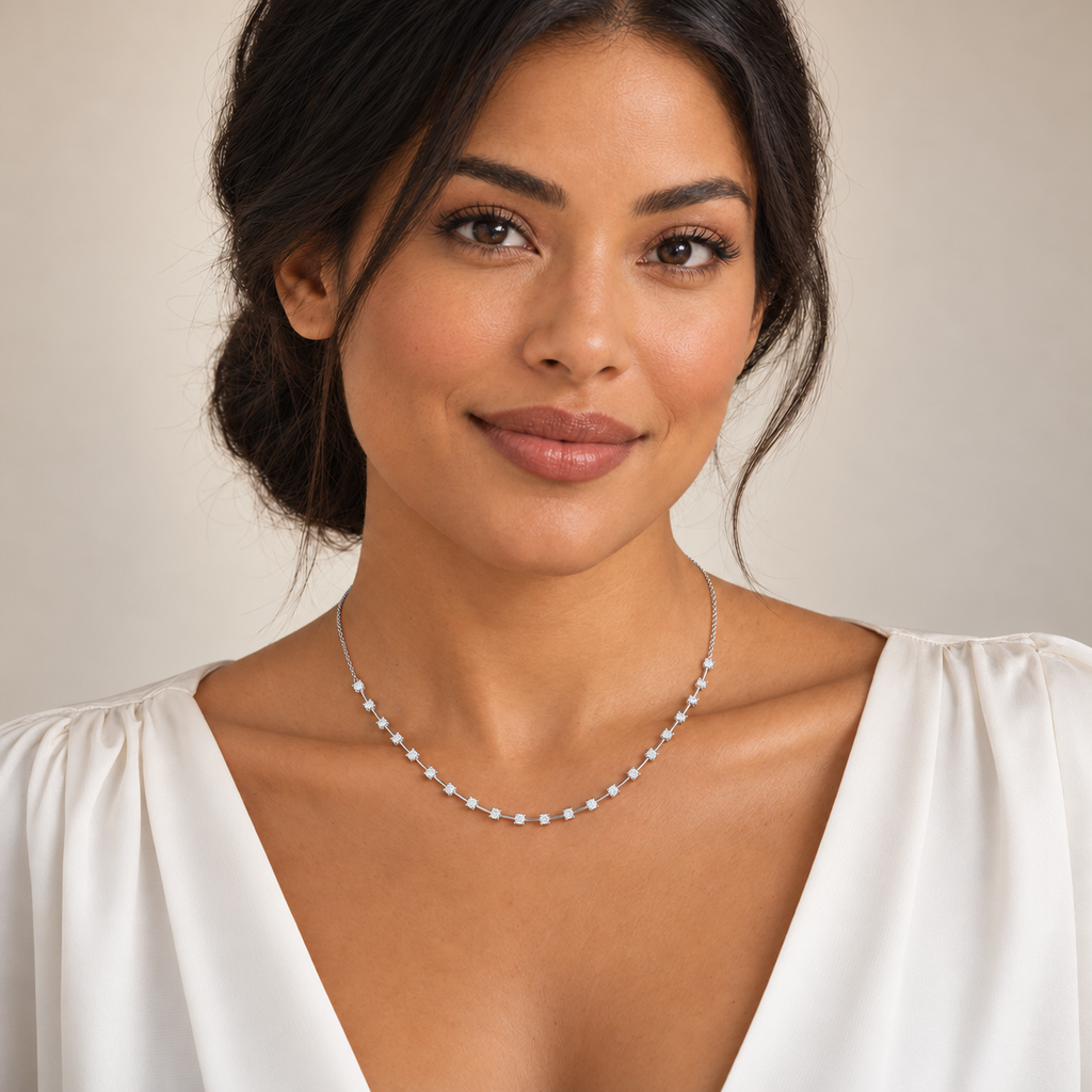 Interval diamond tennis necklace in 14K white gold on a new model, full-face portrait; illustrative scale.; reference design; reference design