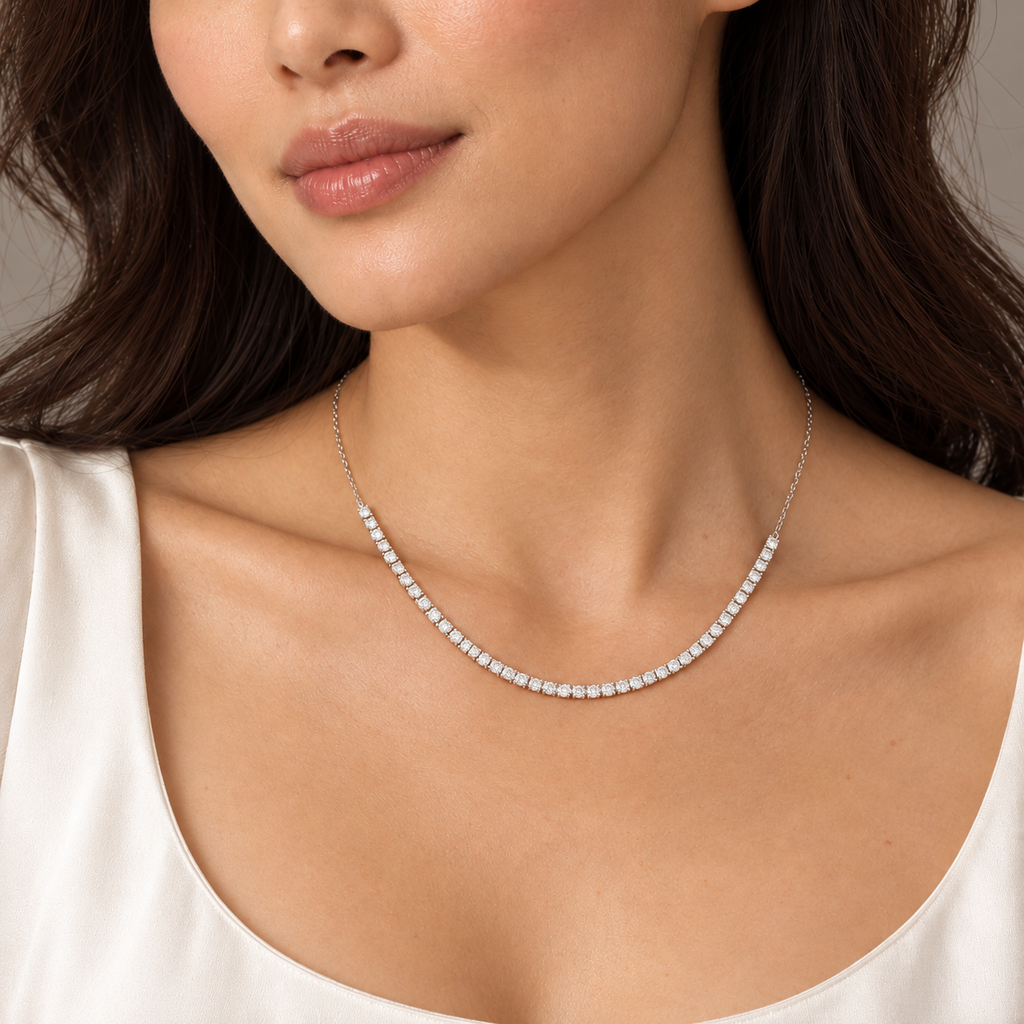 Half tennis necklace in 14K white gold on model — close-up; illustrative scale