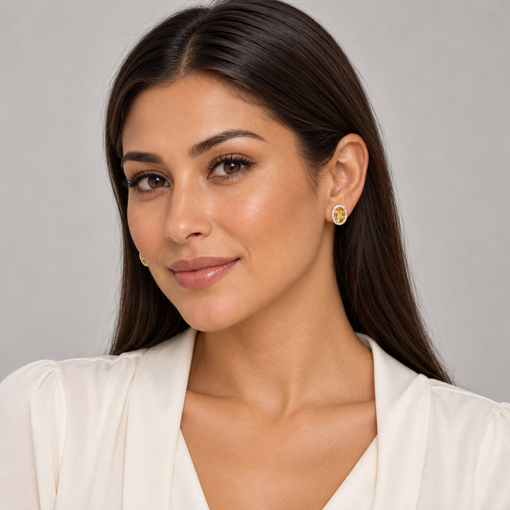 AZ29574 full-face model wearing oval citrine and diamond halo stud earrings in 14K yellow gold