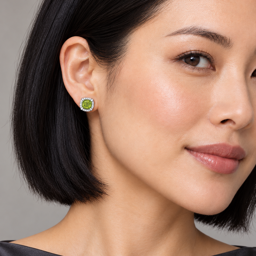 AZ29636 peridot and diamond halo stud earrings on model, close-up