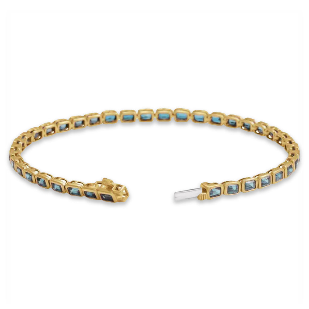 Emerald Cut Sky Blue Topaz Tennis Bracelet 14K Yellow Gold (8.58ct)