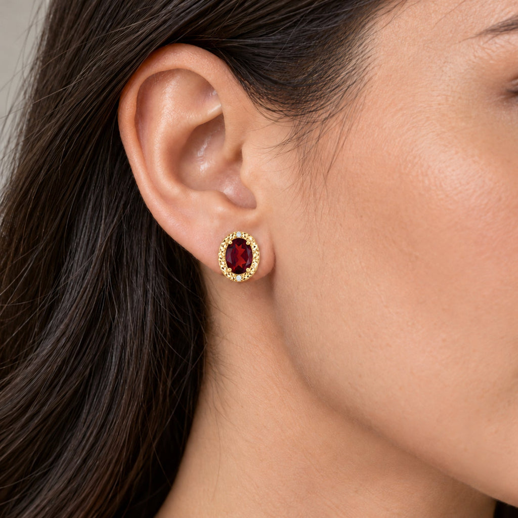 Oval lab ruby and lab diamond earrings 14K yellow gold, 6x4 mm — close-up model