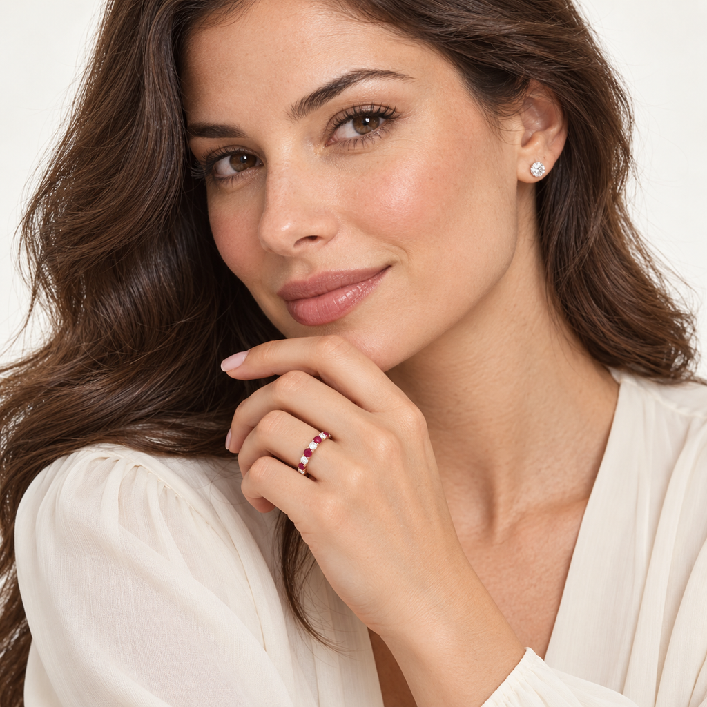 Eternity diamond and ruby ring band in 14k rose gold in a professional studio portrait