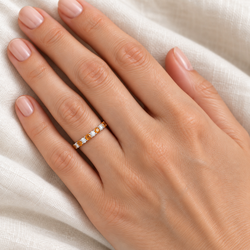 Citrine and diamond 2mm band in 14k white gold — left ring finger close-up