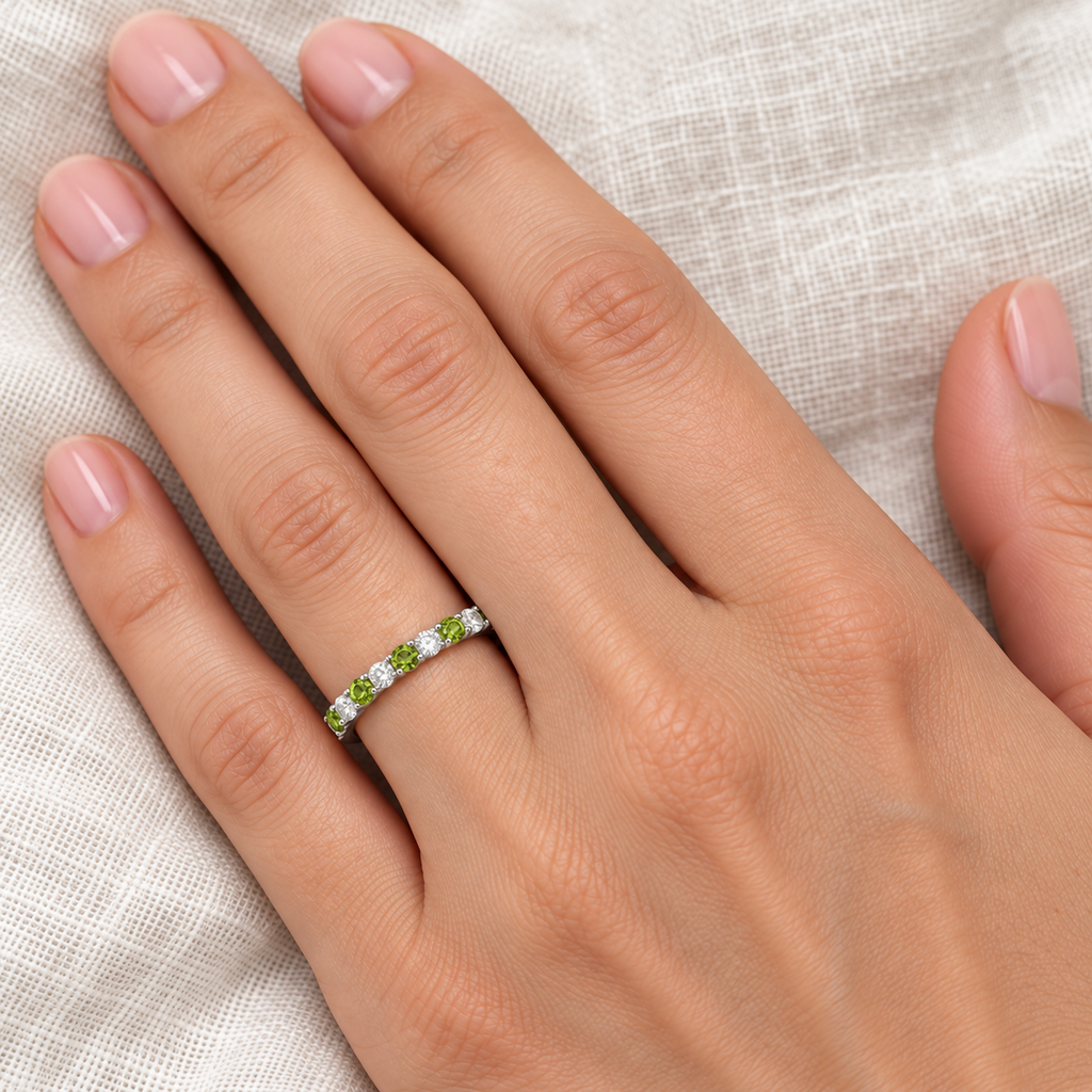 Natural peridot and diamond 2 mm band in 14k white gold — closeup