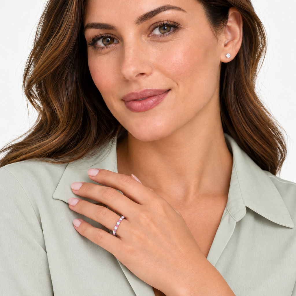 Lab-grown pink sapphire and lab-grown diamond 2 mm band in 14k white gold — studio portrait