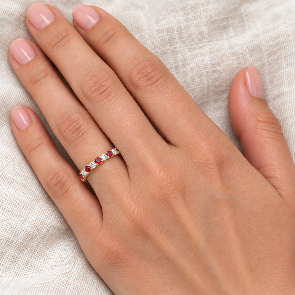 Lab-grown ruby and lab-grown diamond 2 mm band in 14k yellow gold — closeup