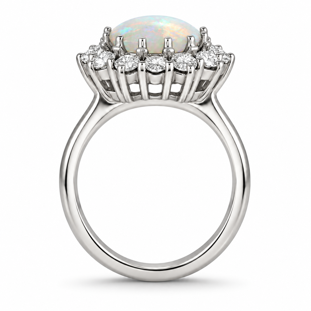 Natural 9x7mm oval milky opal cabochon and twelve white diamond halo ring in 18k white gold, side view with smooth rounded upper inner band and circular opening