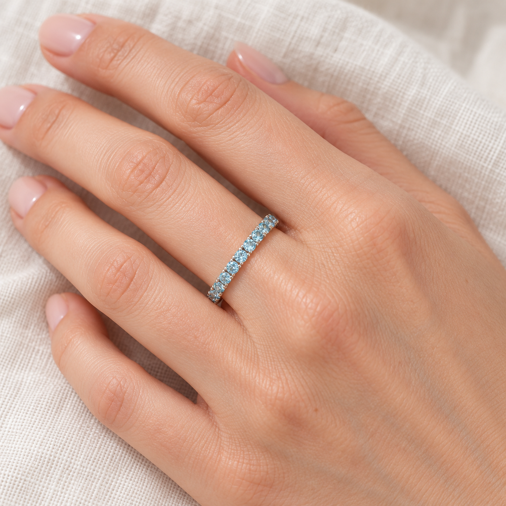 Aquamarine Eternity Stackable Ring Guard Band 14K White Gold (0.50ct) — ivory linen close-up on left hand