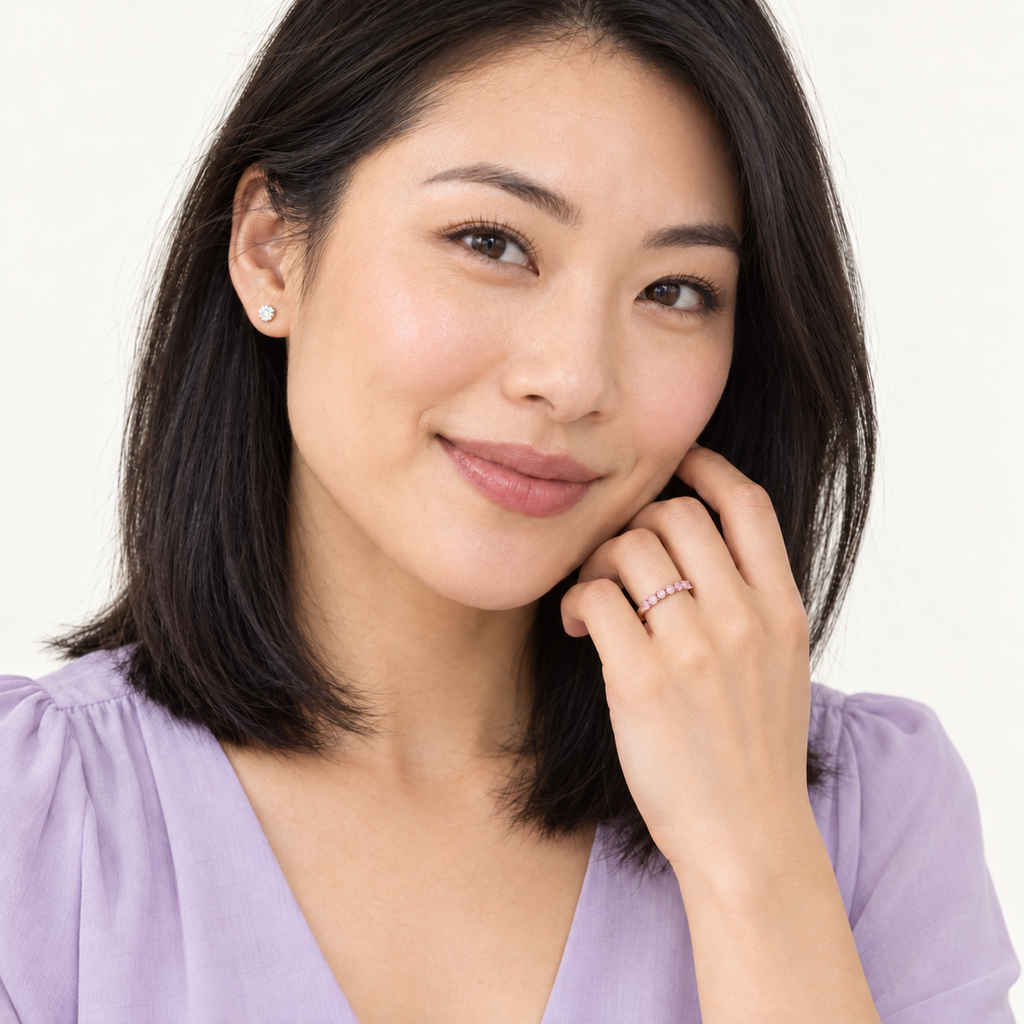 Natural pink sapphire 2 mm stackable band in 14k rose gold — studio portrait