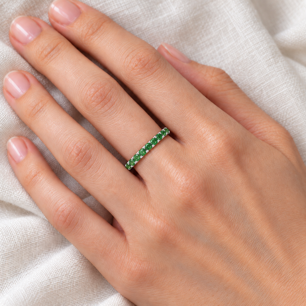 Emerald Eternity Stackable Ring Band 14K White Gold (0.75ct) — ivory linen close-up on left hand