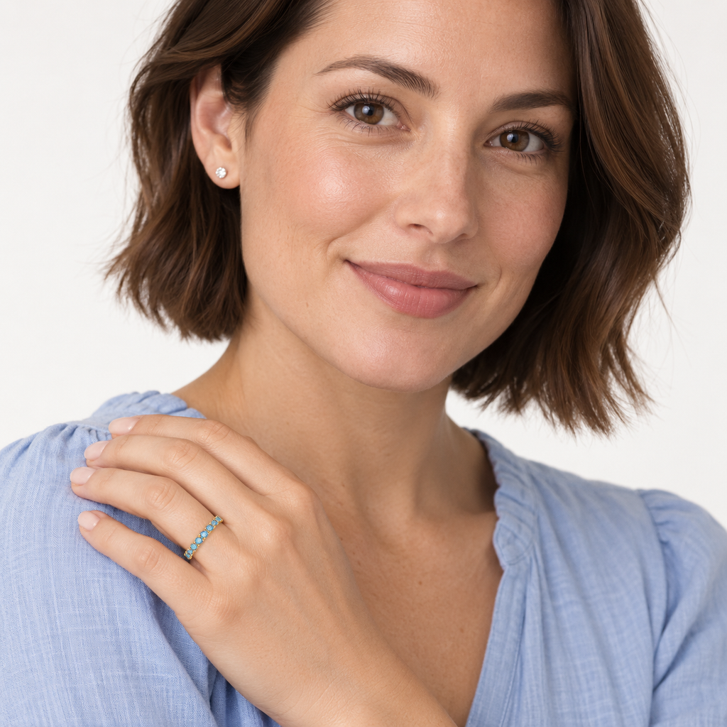IR225 natural blue topaz 14k yellow gold band — portrait
