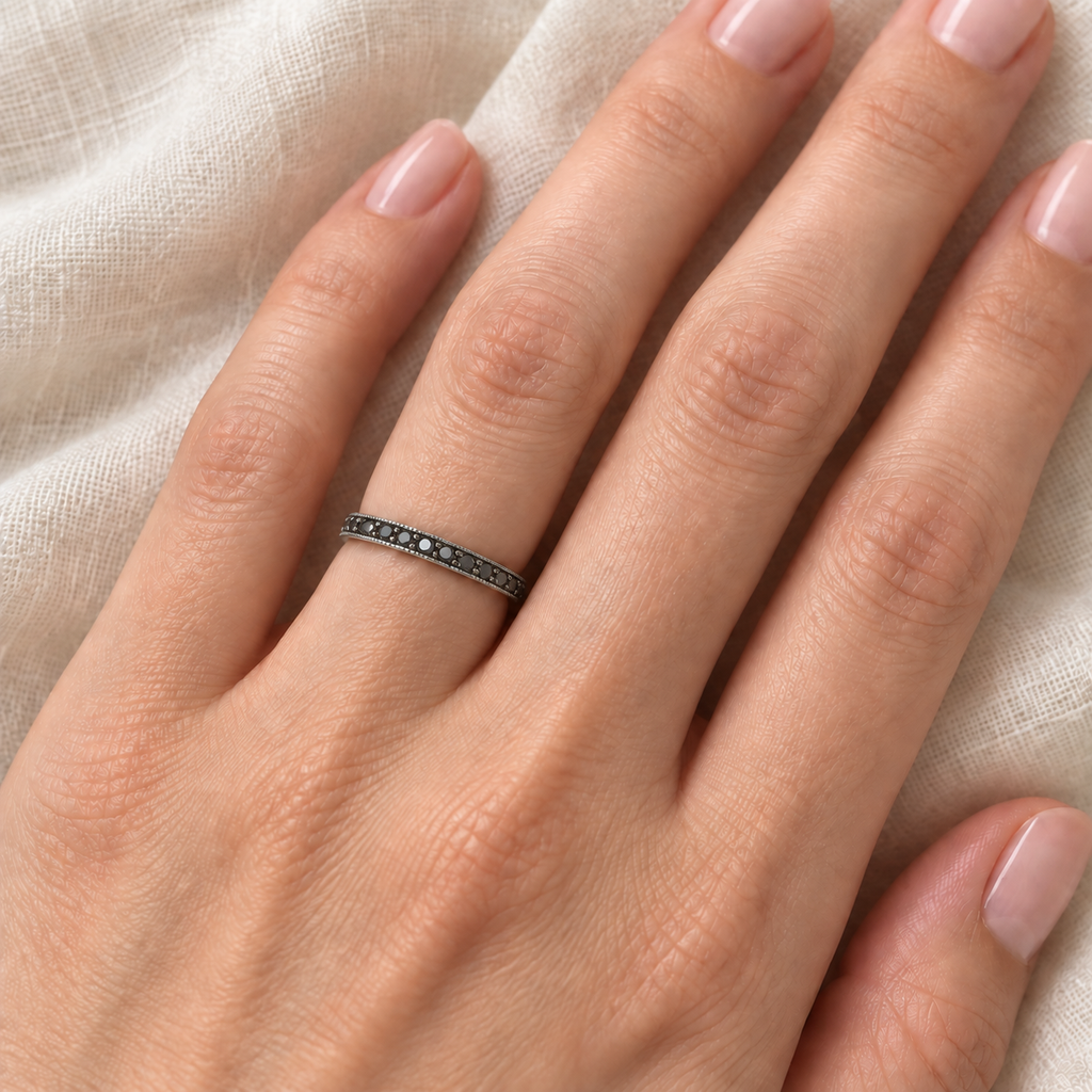 Black Diamond Stackable Ring Guard in 14K White Gold — 2 mm band close-up on ivory linen