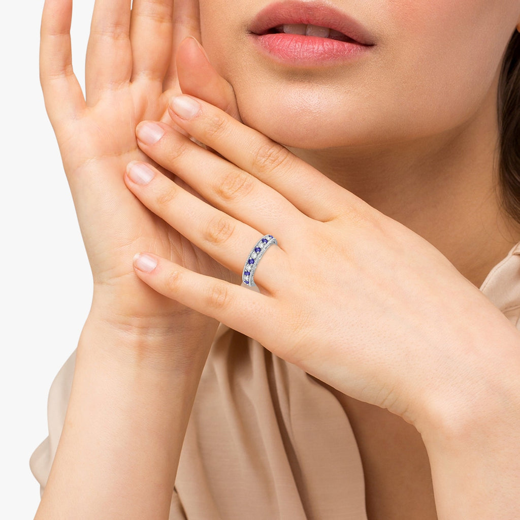 Tanzanite and diamond anniversary band in 14K white gold, 0.30ct, face-visible studio portrait