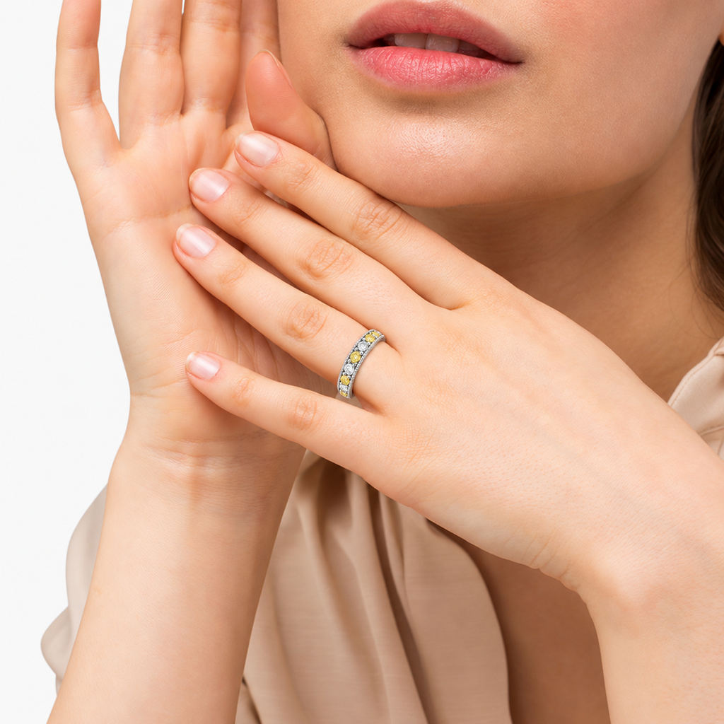 Fancy yellow canary and white diamond anniversary band in 14K white gold, 0.30ct face-visible studio portrait