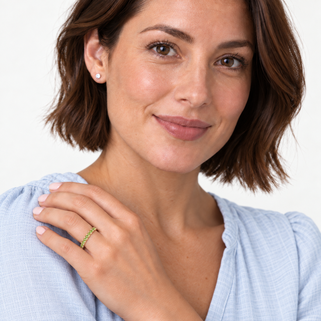 IR245 natural peridot 14k yellow gold 2 mm band — studio portrait