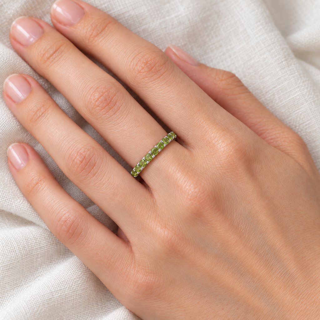 Peridot Eternity Stackable Ring Band 14K White Gold (0.75ct) — ivory linen close-up on left hand