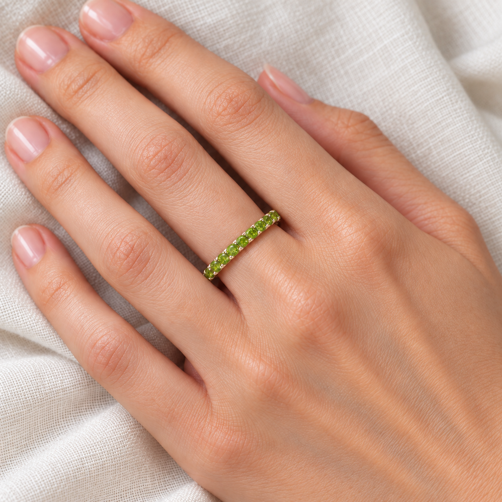 Peridot Eternity Stackable Ring Band 14K Yellow Gold (0.75ct) — ivory linen close-up on left hand
